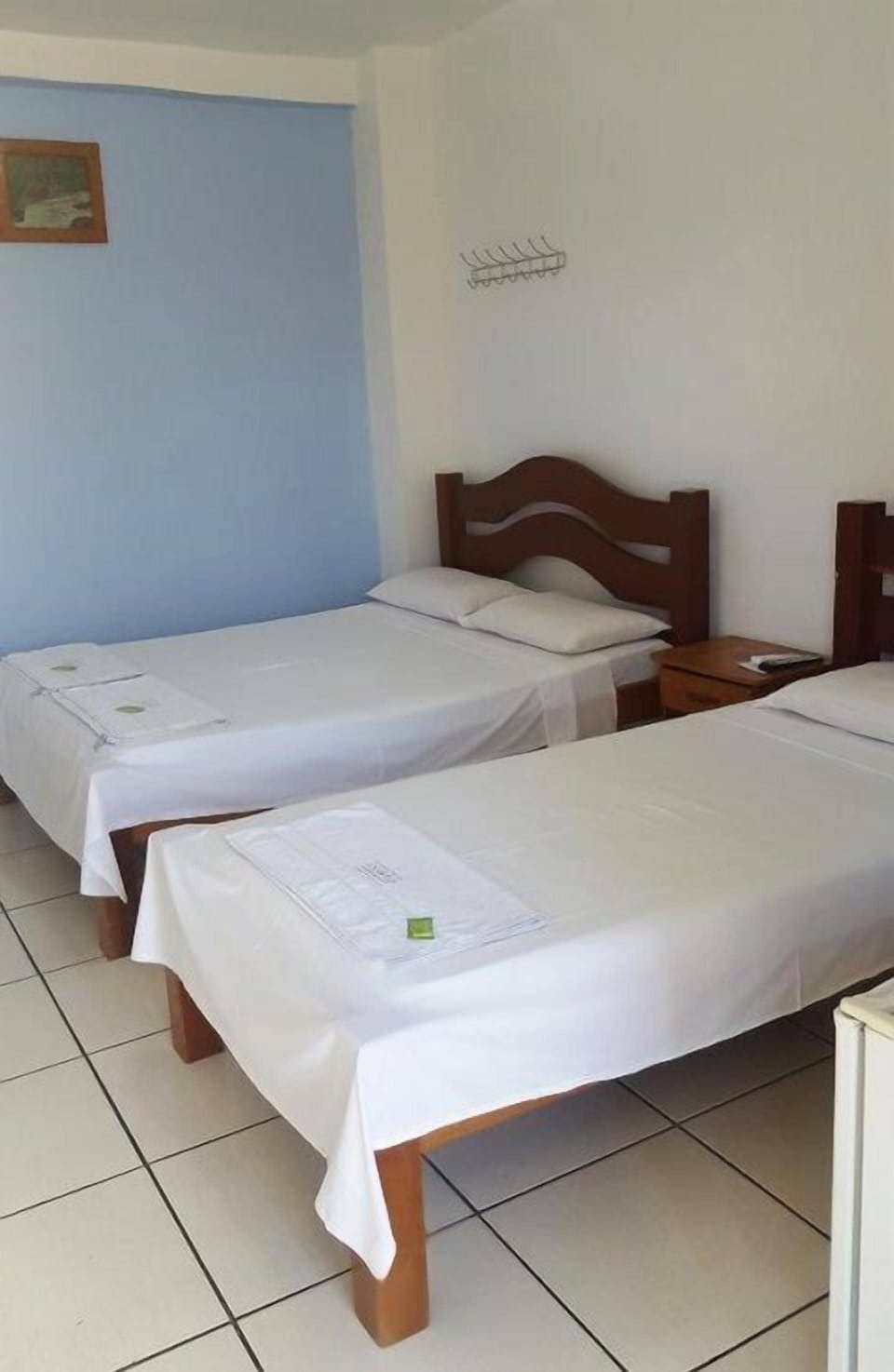 Standard Triple Room | Minibar, blackout drapes, iron/ironing board (on request), WiFi (free)