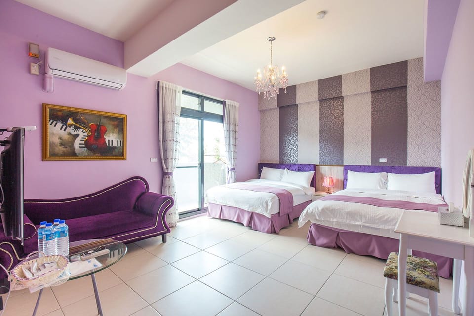 Deluxe Quadruple Room | Desk, blackout drapes, free WiFi, bed sheets