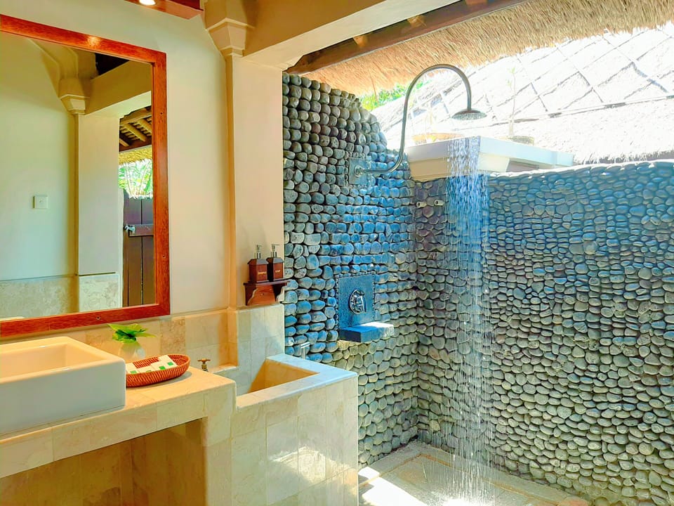Shower, free toiletries, hair dryer, slippers