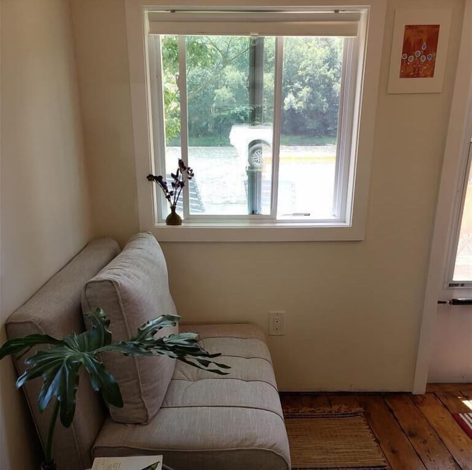 Converts from a loveseat to a chaise lounge or a bed