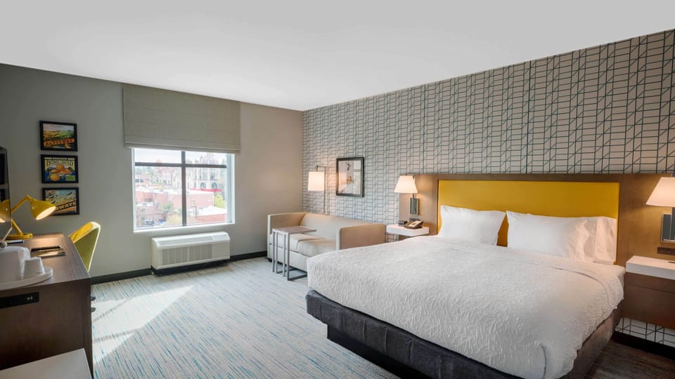 Hypo-allergenic bedding available, in-room safe, desk, laptop workspace