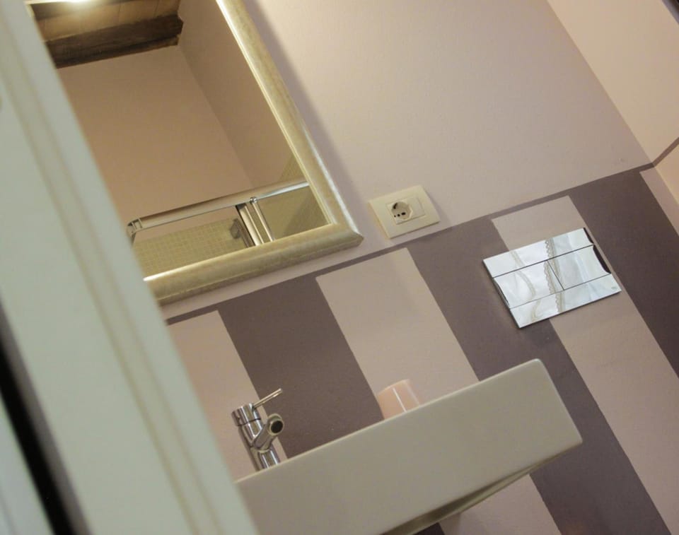 Shower, free toiletries, hair dryer, bathrobes