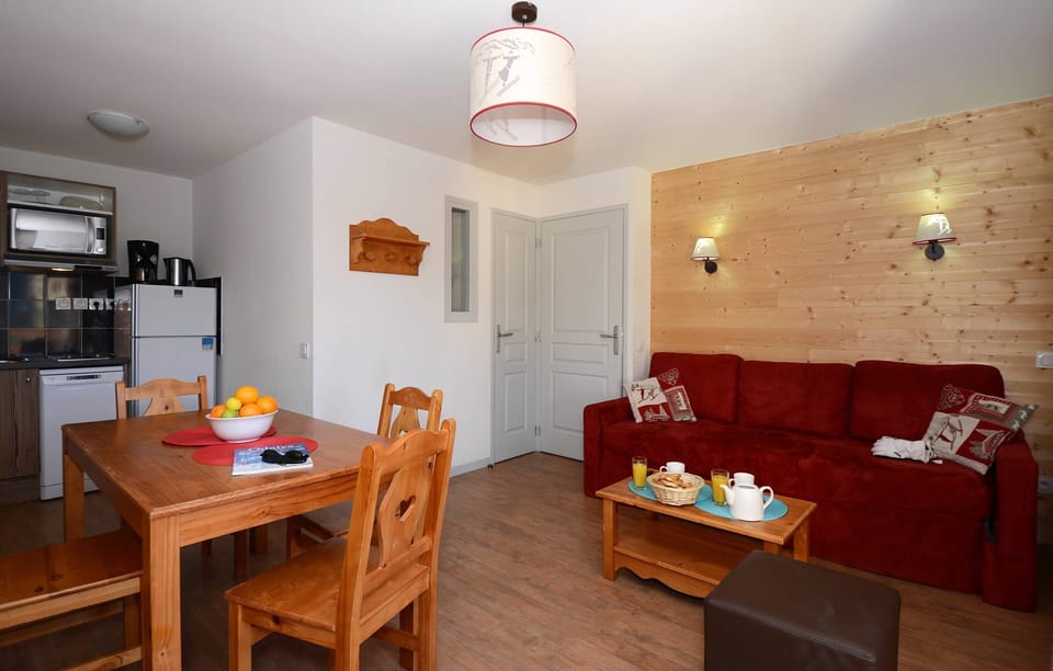 Relax in the open-concept living space which adjoins with the dining area. The lay out may vary slightly from the photos.