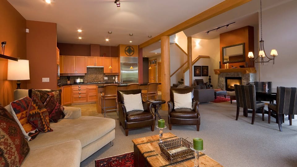 - Open-concept living with fireplace and spacious seating  
- Rustic charm blends with modern comfort throughout  
- Ideal for families seeking warmth and mountain tranquility  
