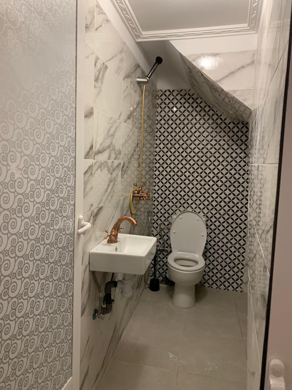 Shower, rainfall showerhead, hair dryer, towels