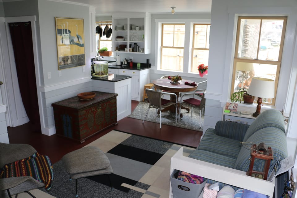 living room looking to dining area and kitchen