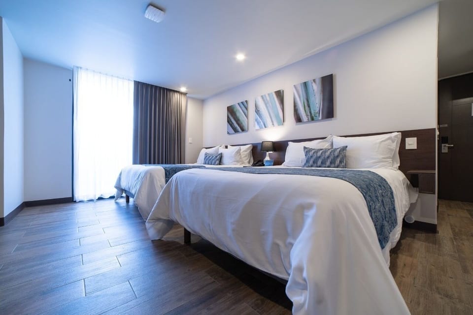 Deluxe Studio Suite, 2 Queen Beds | 1 bedroom, premium bedding, down comforters, minibar