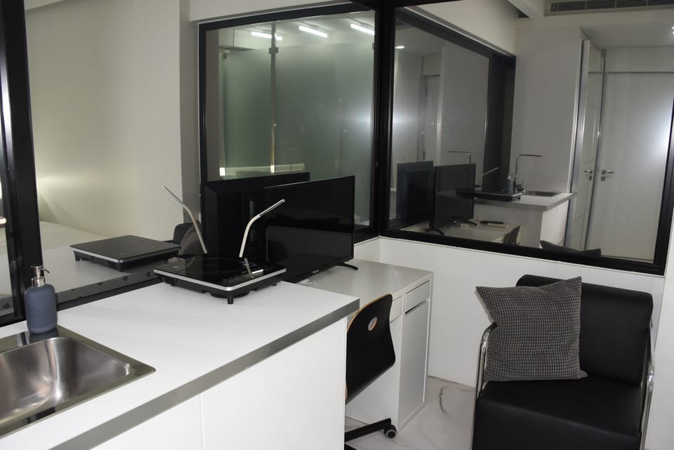 Deluxe Double or Twin Room | Private kitchen | Fridge