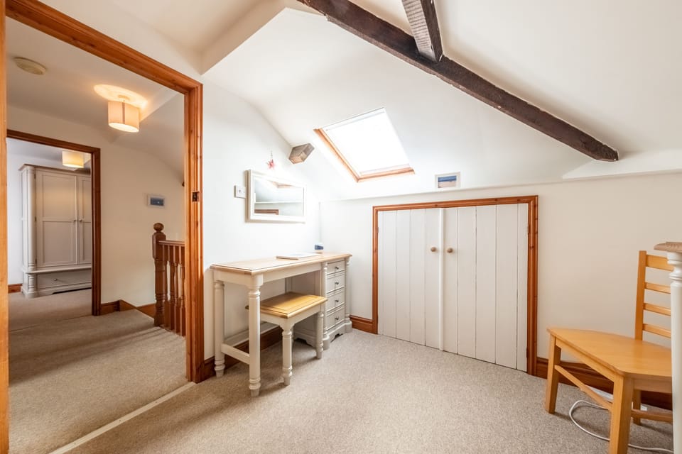 First floor: The master bedroom with a king-size zip and link bed which can be made up as twin beds