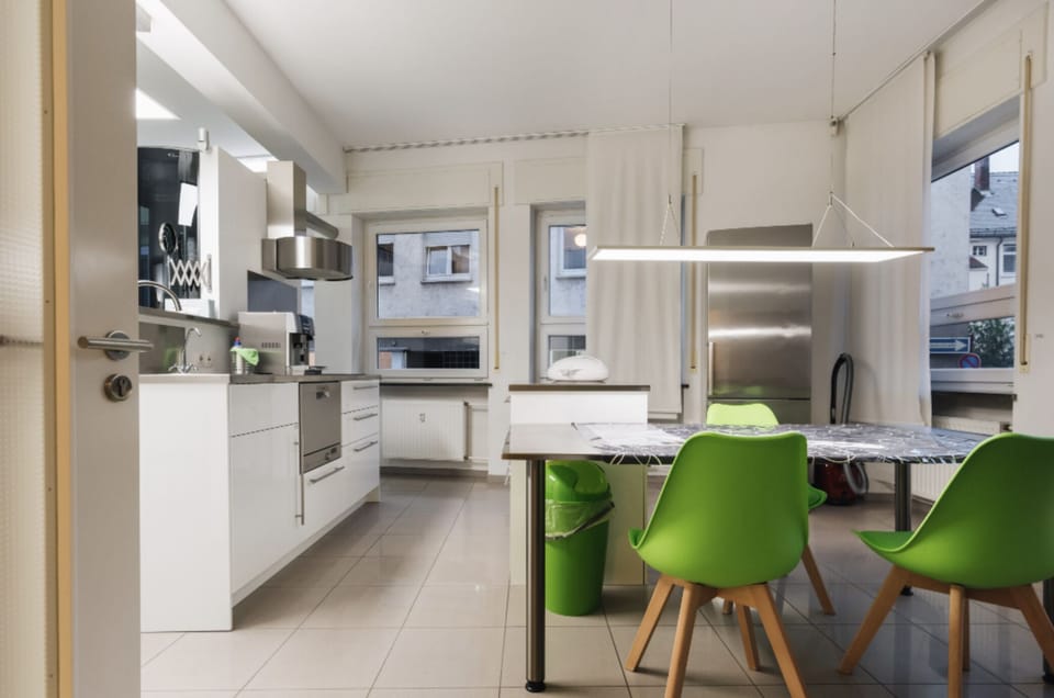 One-Bedroom Apartment | Living area | 55-inch flat-screen TV with satellite channels, TV, fireplace