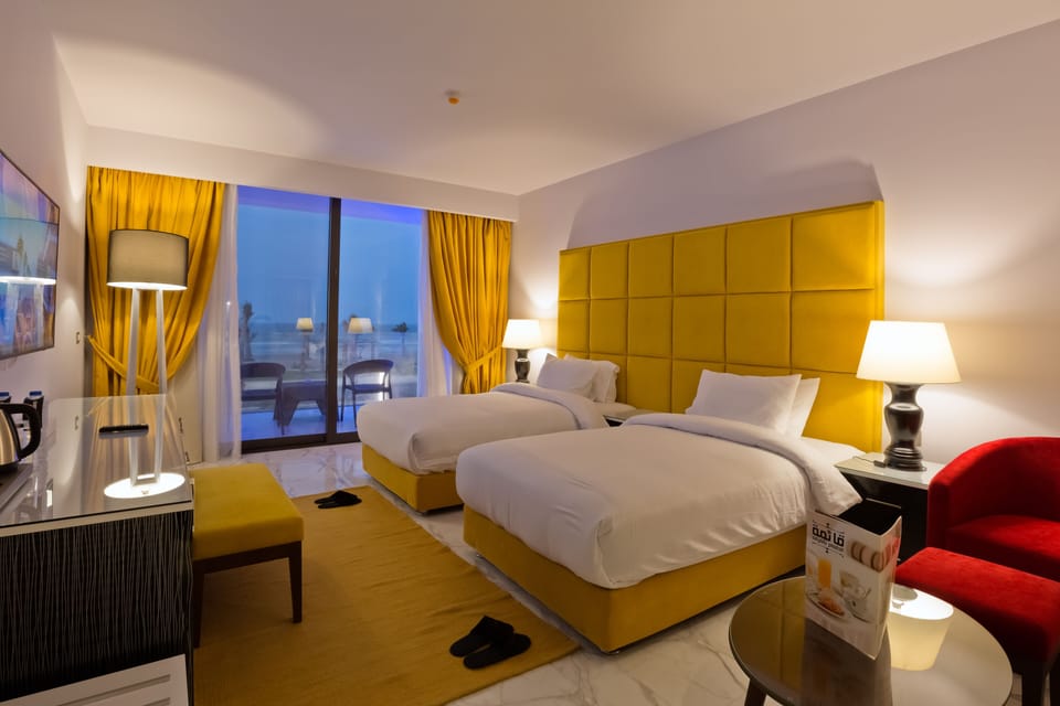 Standard Double or Twin Room, Sea View | Minibar, in-room safe, blackout drapes, soundproofing