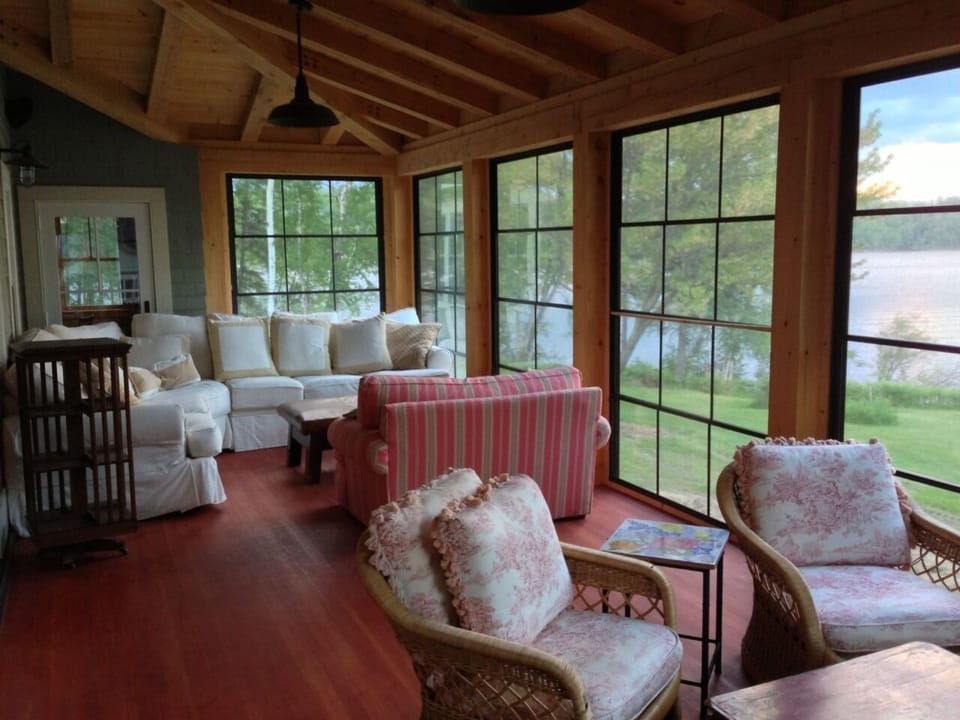 Screen porch with panels that slide down