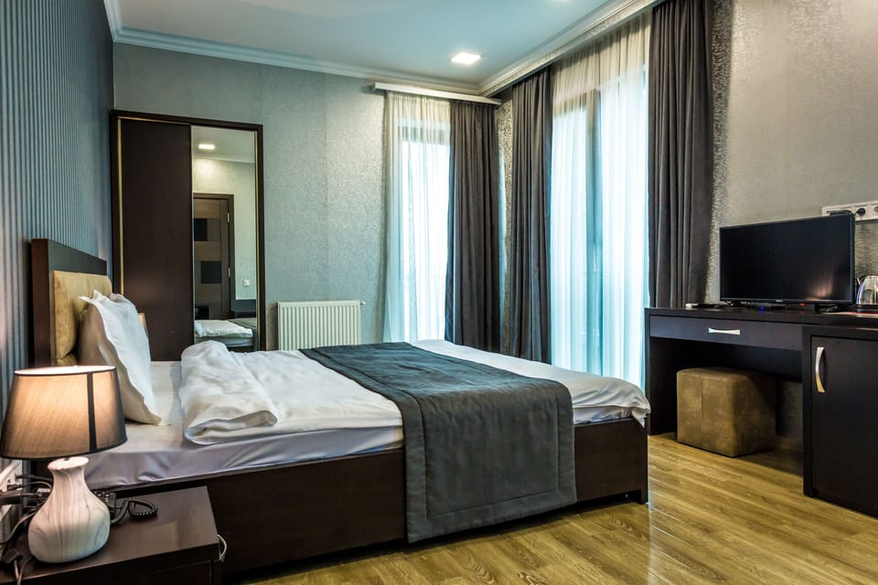 Premium bedding, memory foam beds, minibar, in-room safe