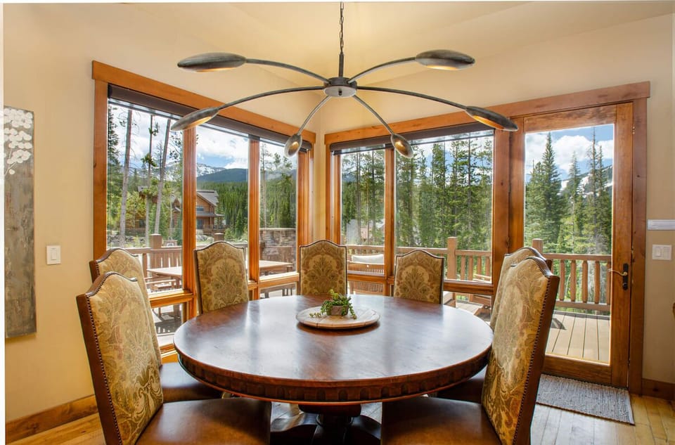 Dining room table for eight with custom lighting