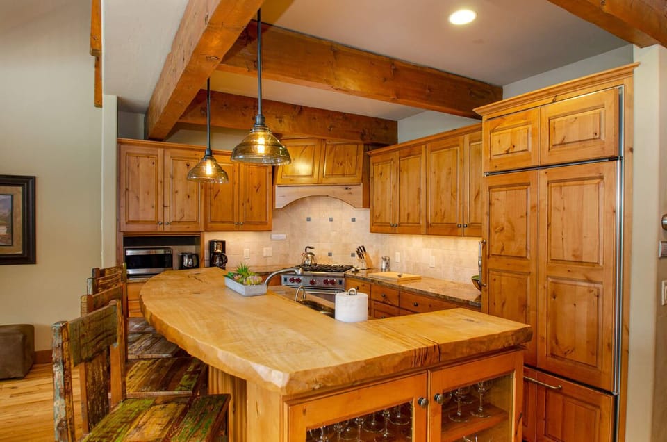 Whip up breakfast in the high-end kitchen with seating for three at the breakfast bar