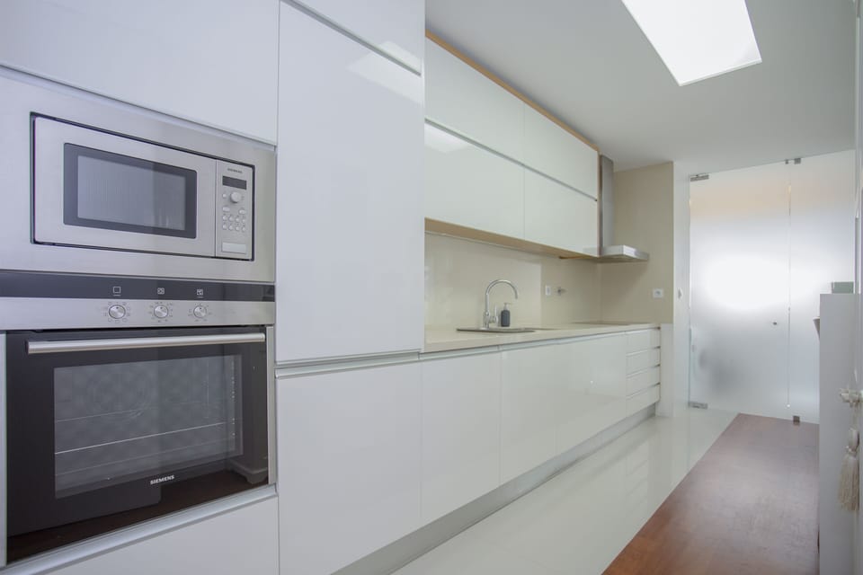 Deluxe Apartment, 2 Bedrooms | Private kitchen | Full-size fridge, microwave, oven, stovetop