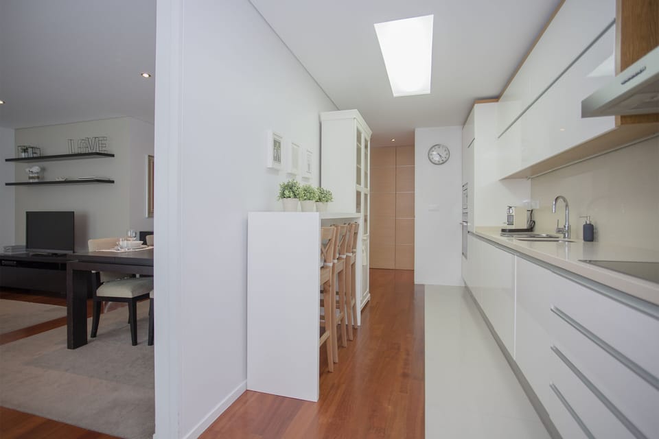 Deluxe Apartment, 2 Bedrooms | Private kitchen | Full-size fridge, microwave, oven, stovetop