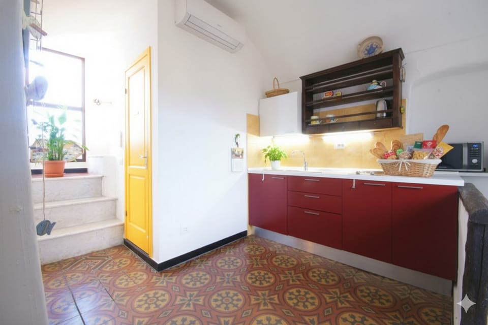 Apartment, 1 Bedroom | Private kitchen | Full-size fridge, microwave, stovetop, coffee/tea maker