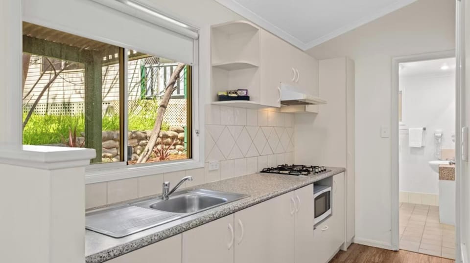 Superior 2 Bedroom Cabin - Sleeps 4 | Private kitchen | Fridge, microwave, stovetop, cookware/dishes/utensils