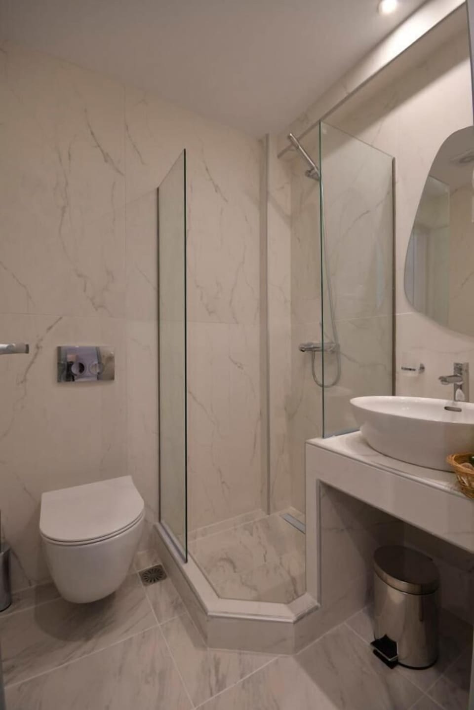 Shower, free toiletries, slippers, towels