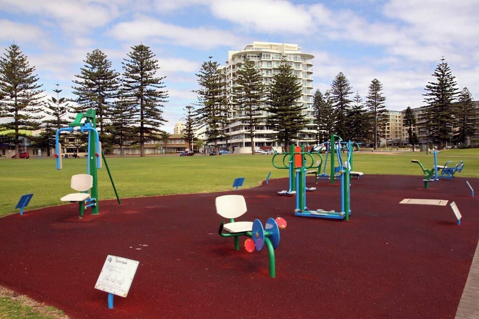 outdoor exercise area in reserve opposite from the apartments