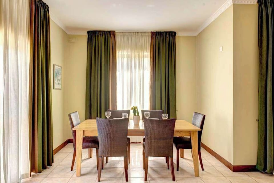 Enjoy delicious meals and great conversations around our elegant dining table.