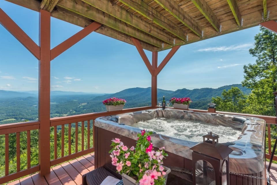 Soak in the luxury hot tub on lower level deck while taking in the breathtaking mountain views!