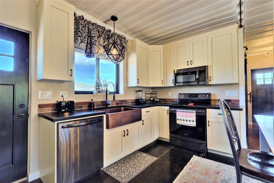 Kitchen Area looking at sink and stove