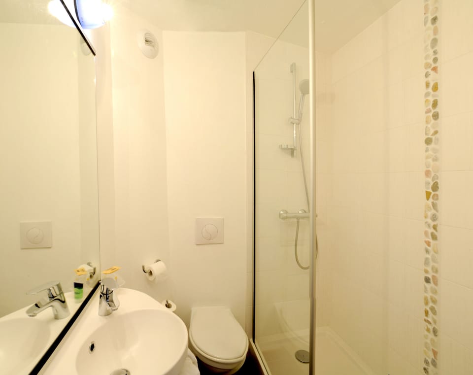 Shower, eco-friendly toiletries, hair dryer, towels