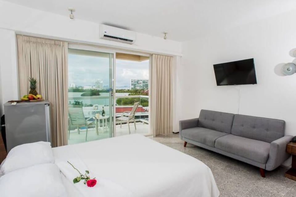 Bedroom 2 with balcony facing lagoon