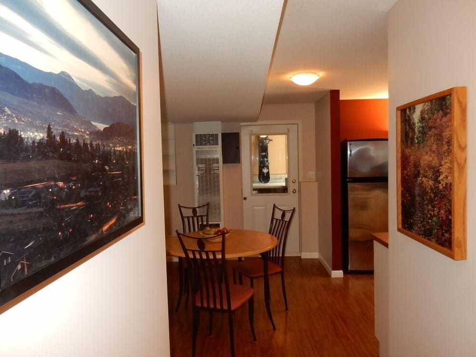 Open concept living area - view from laundry area to entrance.