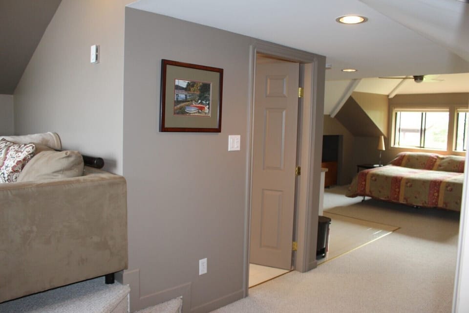 Bathroom situated between bedroom and lounge
