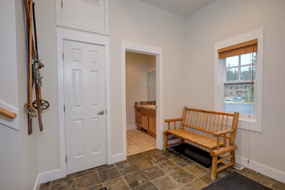 Entry area with hooks for coats, hats, gloves and a bench for easy shoe removal