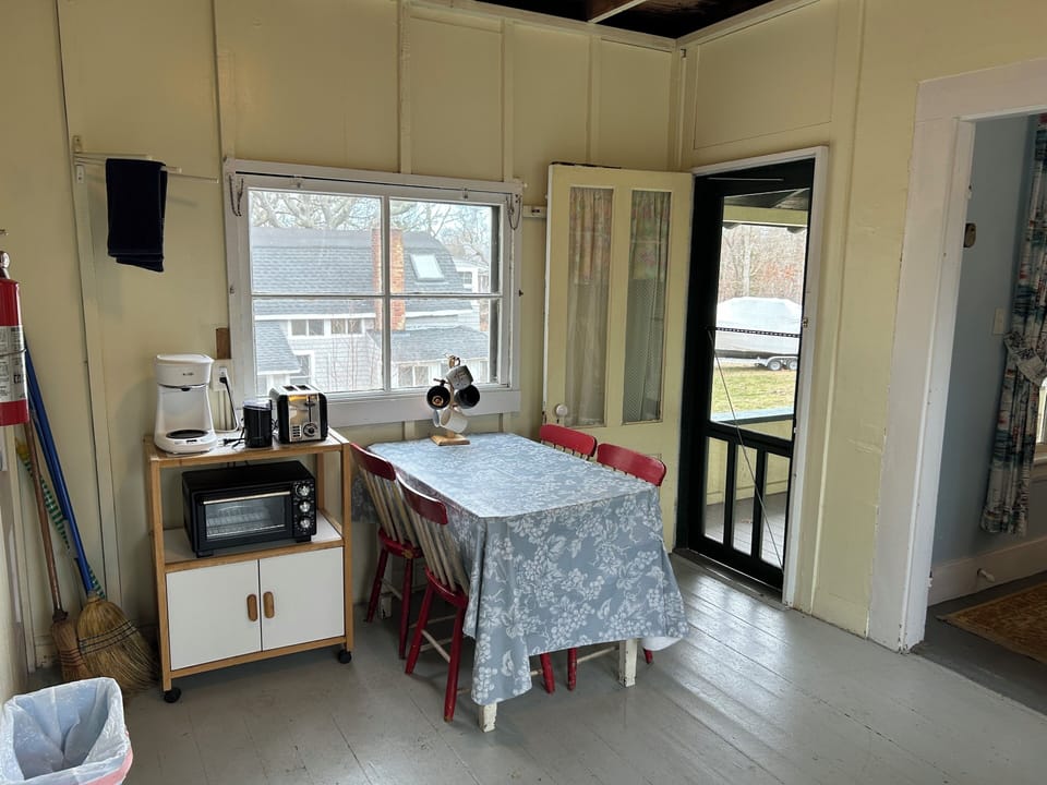 Kitchen table, door to wrap-around porch.