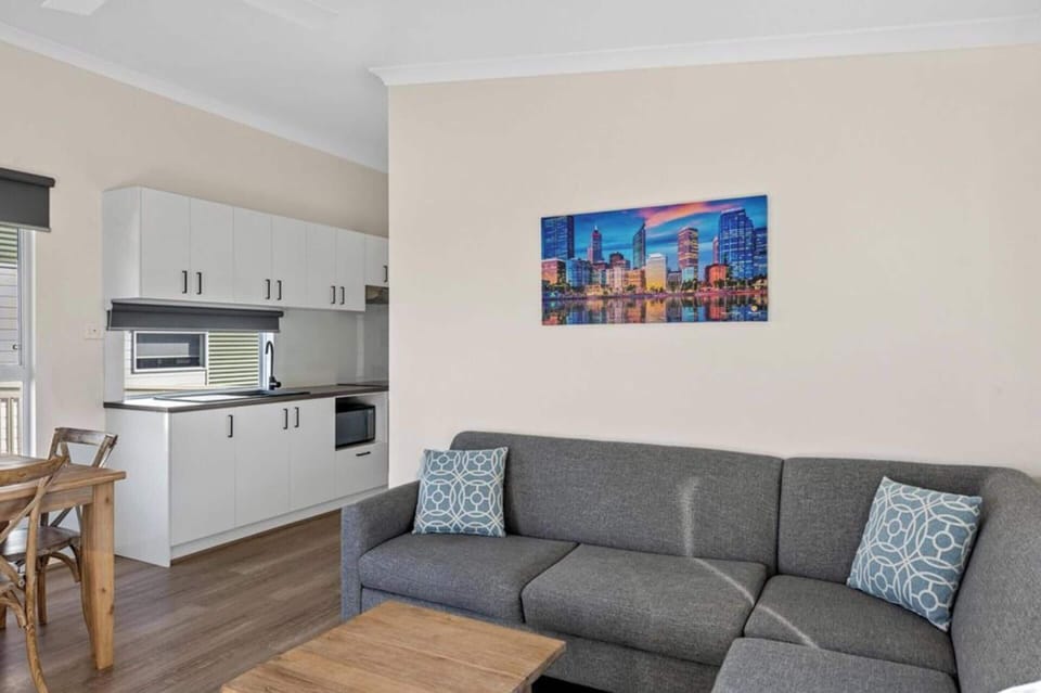 Deluxe 2 Bedroom Cabin - Sleeps 5 | Living area | LCD TV