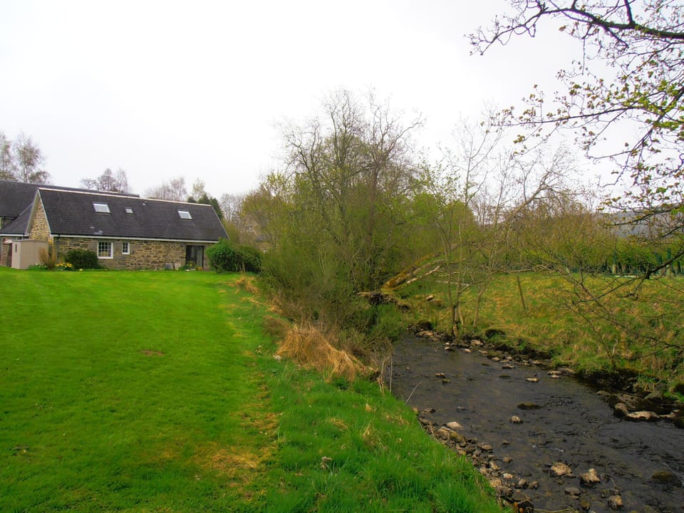 Camserney Burn bordering the small holding