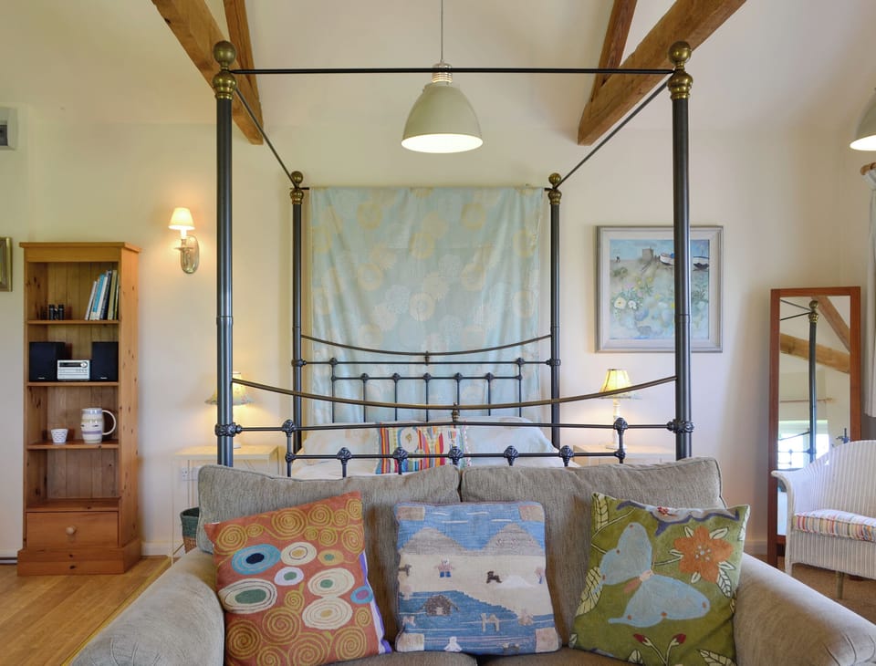 Relaxing four poster bed | The Studio, Hinton, near Saxmundham