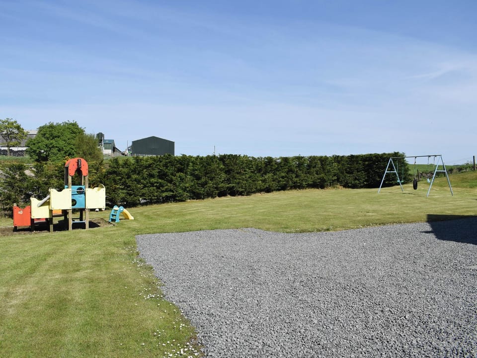 Garden with children&rsquo;s play area | Lawford Lodge, Bonnybridge, near Falkirk