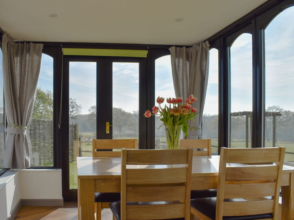 Conservatory with dining area | Woodpeckers, Cowbeech, near Hailsham