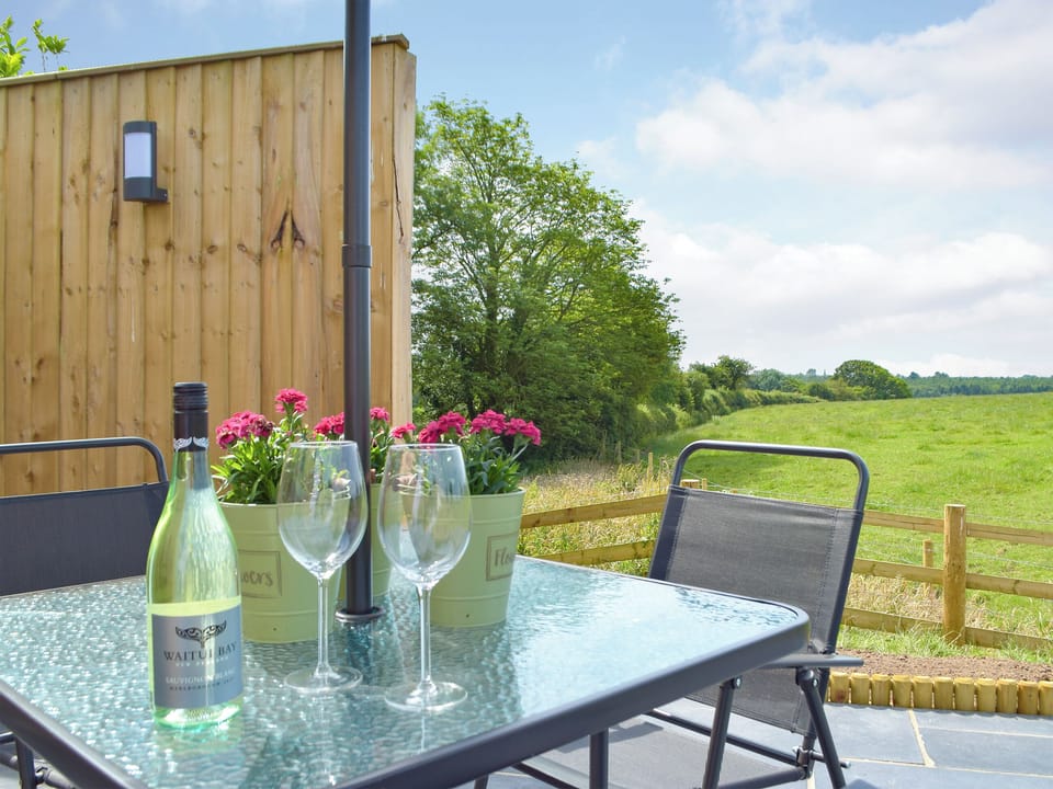 Delightful sitting out area on an additional patio area | Manor Lodge Stables, Wiston, near Haverfordwest