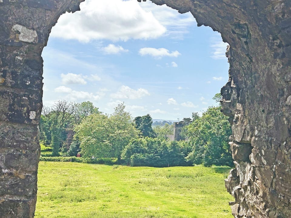 A view from the remains of Wiston Castle towards the church and beyond | Manor Lodge Stables, Wiston, near Haverfordwest