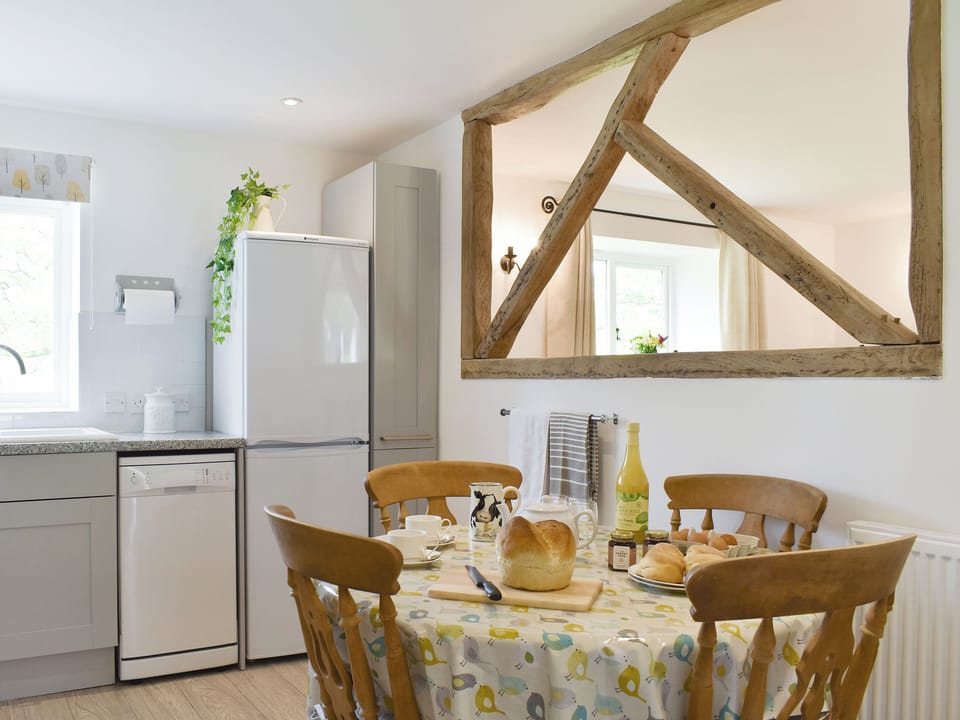 Convenient dining area within kitchen | Cherry Cottage - Wood Dairy, North Perrott, near Crewkerne