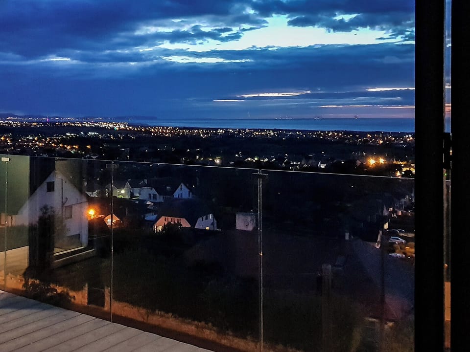 Stunning night-time views over Prestatyn | Hillside Retreat, Prestatyn