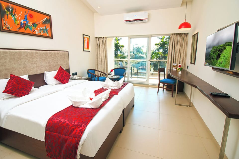 Standard Twin Room, 2 Twin Beds, Non Smoking | Free minibar items, in-room safe, soundproofing, iron/ironing board