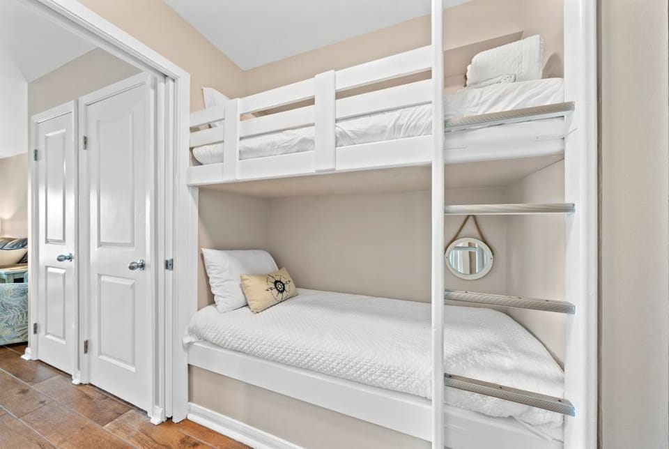 Your cozy bunk bed nook features fresh linens and thoughtful touches, creating the perfect retreat for restful nights.