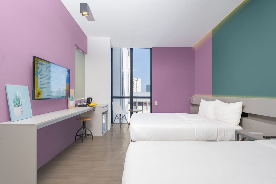 Executive Room, Multiple Beds | Laptop workspace, blackout drapes, iron/ironing board, free WiFi