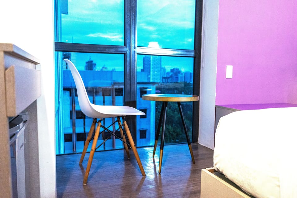 Executive Room, Multiple Beds | Laptop workspace, blackout drapes, iron/ironing board, free WiFi