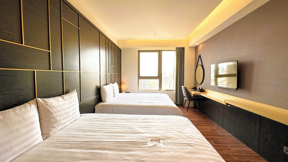 Deluxe Quadruple Room | Premium bedding, down comforters, individually decorated, desk