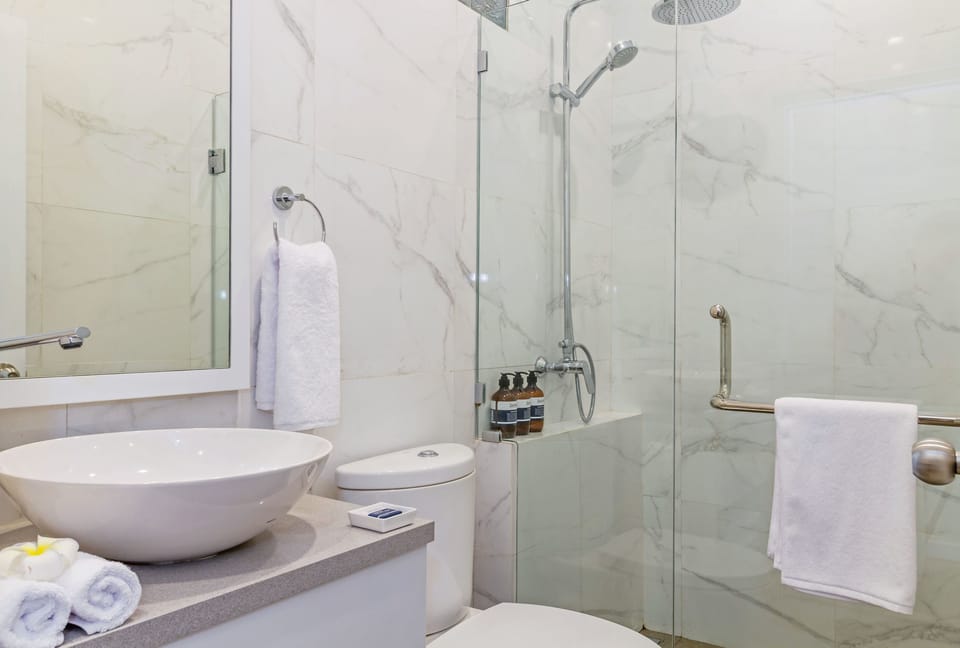 Deluxe Room, Terrace, Pool View | Bathroom | Shower, hair dryer, slippers, towels