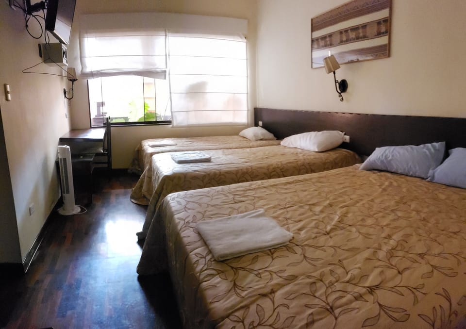 Family Room | Down comforters, in-room safe, desk, laptop workspace